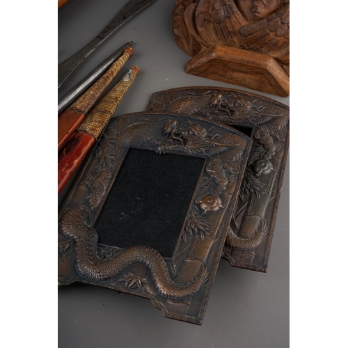 144 - A box of 19th and 20th century metalware, etc, including an early 20th century foliate embossed bras... 