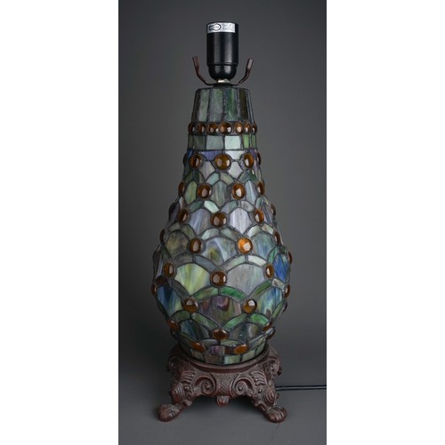 508A - A Continental Tiffany style stained glass lamp stylised fan decoration to shade and stand with amber... 