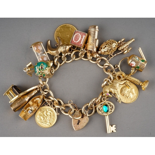 13 - A 9ct yellow gold charm bracelet, suspending a 1909 sovereign and two half sovereigns 1911/1914, and... 