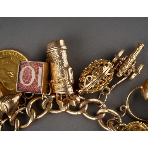 13 - A 9ct yellow gold charm bracelet, suspending a 1909 sovereign and two half sovereigns 1911/1914, and... 