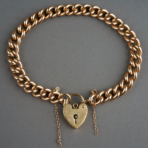 24 - A 9ct gold curb-link bracelet, padlock clasp, total gross weight approx 24g