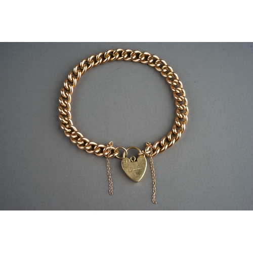 24 - A 9ct gold curb-link bracelet, padlock clasp, total gross weight approx 24g