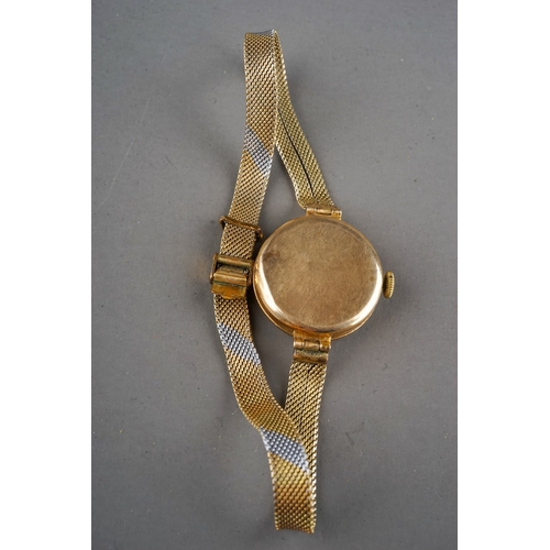 51 - A ladies 9ct yellow gold wristwatch with expandable 9ct strap, gross weight approx 13.8g; and a gold... 