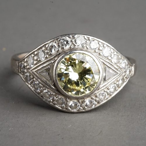 53 - Platinum Diamond and Fancy Yellow Diamond Ring, hallmarked to shank London 1994, approx 1 ct to cent... 