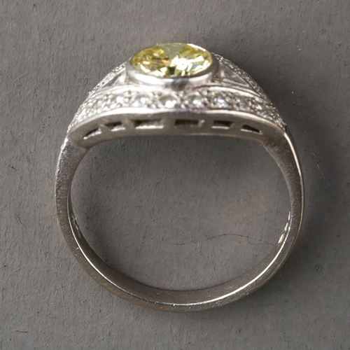 53 - Platinum Diamond and Fancy Yellow Diamond Ring, hallmarked to shank London 1994, approx 1 ct to cent... 