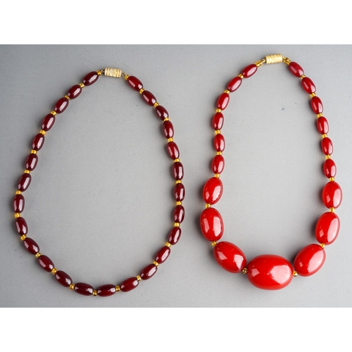 60 - Two Cherry Amber Necklaces, total weight 64g