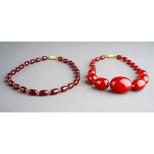 60 - Two Cherry Amber Necklaces, total weight 64g