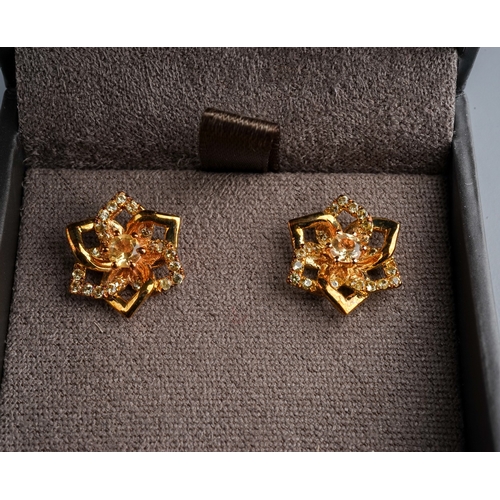 79 - A pair of 9 ct Clogau earrings in form of a flower set with citrine and white topaz.