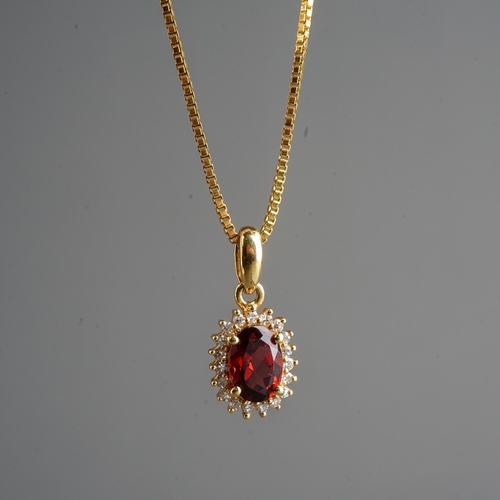 82 - 18 ct gold necklace with a diamond and garnet pendant set in 18 ct ( gross weight 3.9g)