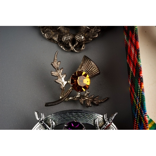 84 - Collection of Scottish Brooches to include two grouse claw ones ( one set in silver), silver and aga... 