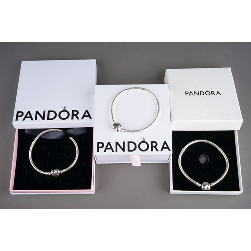 97 - Three Pandora bracelets, boxed