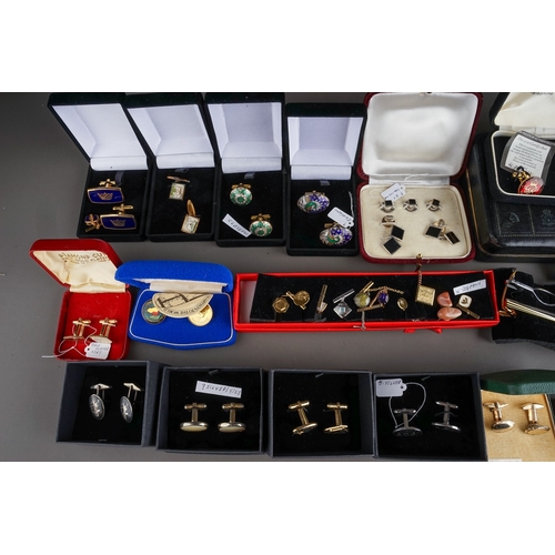 99 - A large quantity of gent's cufflinks and shirt studs, including gold plated, rolled gold, Armani; en... 