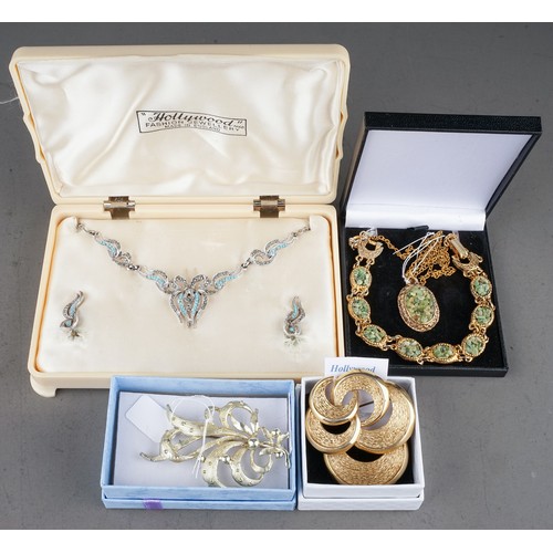 108 - Collection of Hollywood costume jewellery to include 2 boxed sets and 2 brooches ( 1 bag)