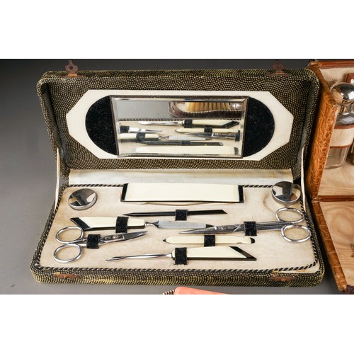 115 - Two various vintage circa 1930s travelling cases, with mirrors, bakelite brushes or chrome mounted b... 