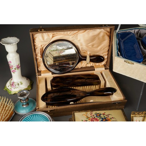 118 - Three mid 20th Century dressing table sets with trays, one set with clock, one set ceramic, together... 