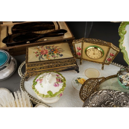 118 - Three mid 20th Century dressing table sets with trays, one set with clock, one set ceramic, together... 