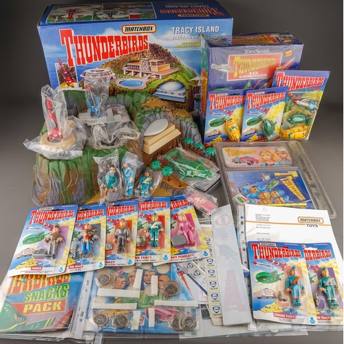 120 - Collection of Thunderbirds toys to include boxed Tracy island, crackers, figures, posters, coins, di... 