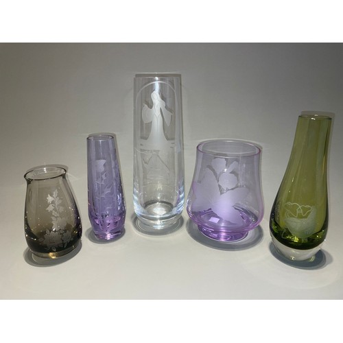 134 - A collection of Caithness etched plain and coloured glass vases to include: Romeo & Juliet from Shak... 