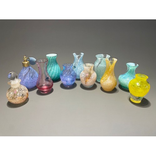 135 - A collection of Caithness glass posy vases, perfume bottle and atomiser, crackle or speckled with wh... 