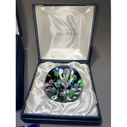 138 - A collection of Caithness glass mainly paperweight to include: 
1. boxed Carousel with Certificate, ... 