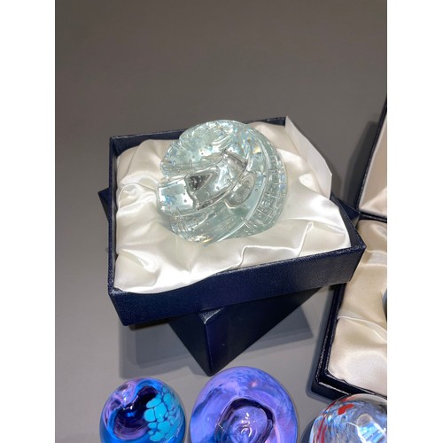 138 - A collection of Caithness glass mainly paperweight to include: 
1. boxed Carousel with Certificate, ... 