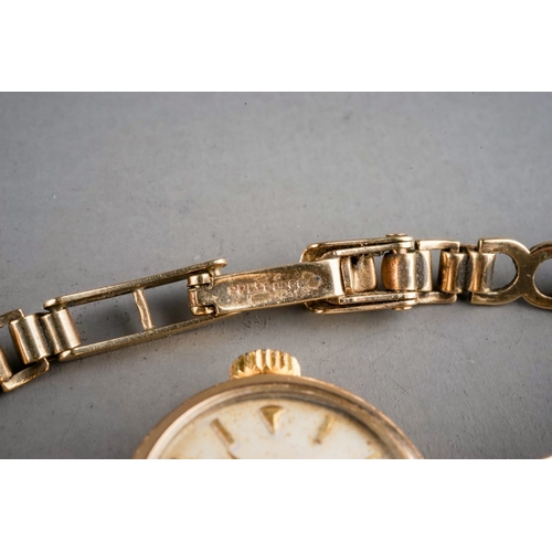 152 - A ladies 9ct yellow gold Omega wristwatch, circular dial, case approx 18mm, integral 9ct gold strap,... 