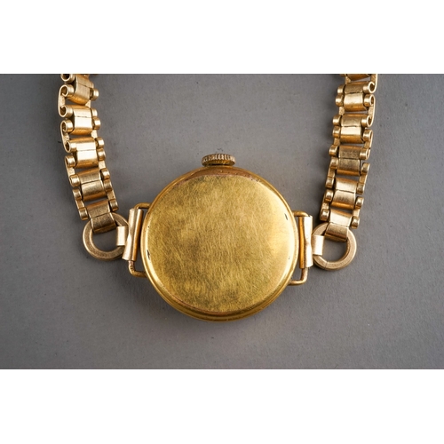 153 - A ladies gold-plated wristwatch, circa 1930s, on a rolled gold bracelet strap