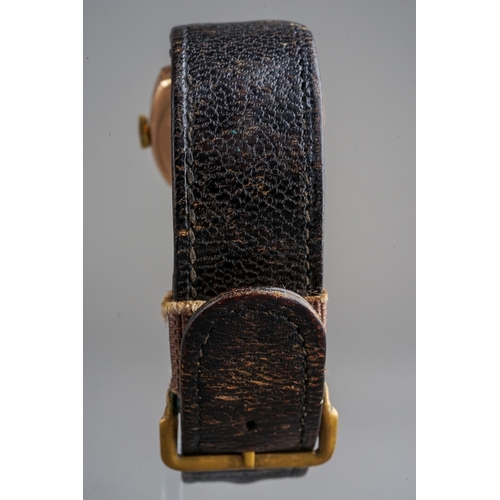 158 - 9ct Gold Men's Wrist Watch, movement marked SWAN, leather strap