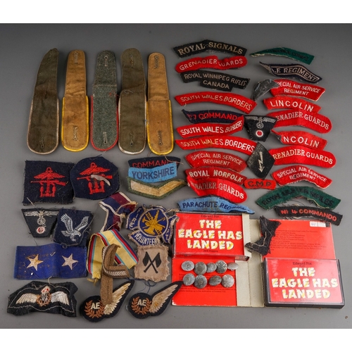 203 - Tin containing a quantity of WW2 era cloth patches including NZ Airforce., Royal Winnipeg Rifles, Gr... 