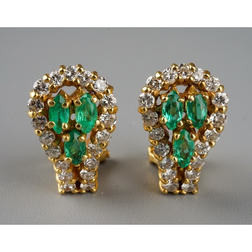 227 - A pair of 18k yellow gold diamond and emerald earrings, each set with three marquise-cut emeralds wi... 