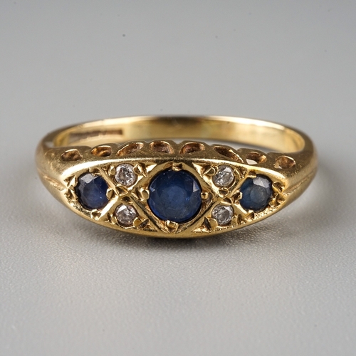 233 - A 9ct yellow gold sapphire and diamond ring, size P, gross weight approx 2.4g