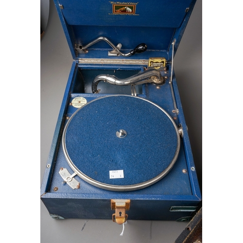 248 - Two HMV portable gramophones and a Marconi RG11A radiogram, the HMV comprising a blue cased model 10... 