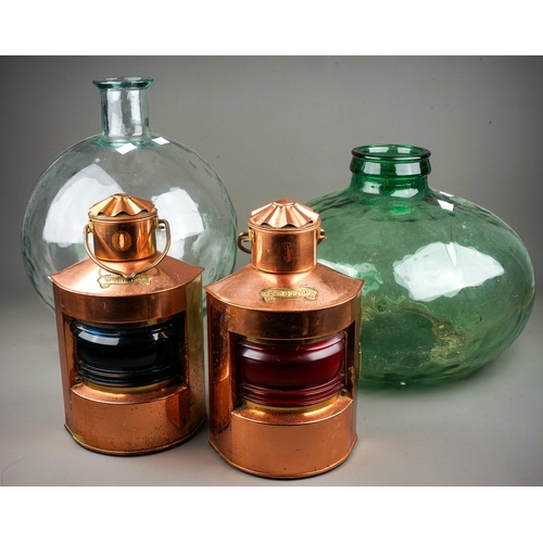 262 - Two reproduction copper ships lights  and two glass carboys (4)