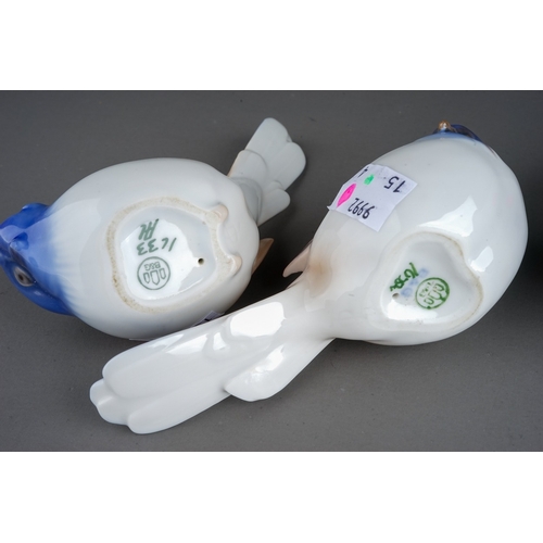 418 - Three Danish Bing & Grondahl figures to include: a pair of finch type birds with blue plumage, patte... 