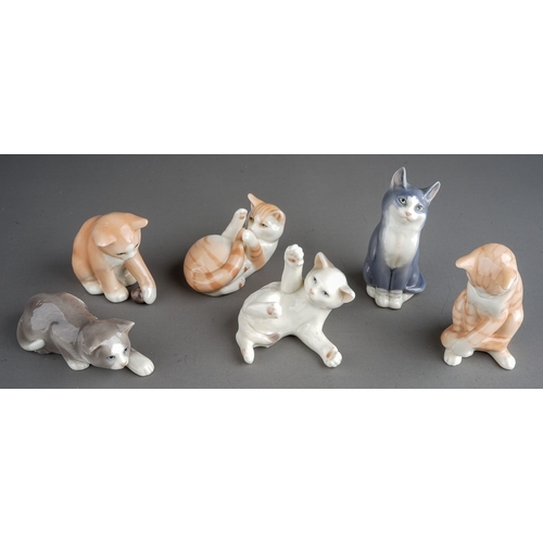 420 - A group of six Royal Copenhagen mini collection cats to include pattern no: 677, 679, 680, 682, 686 ... 