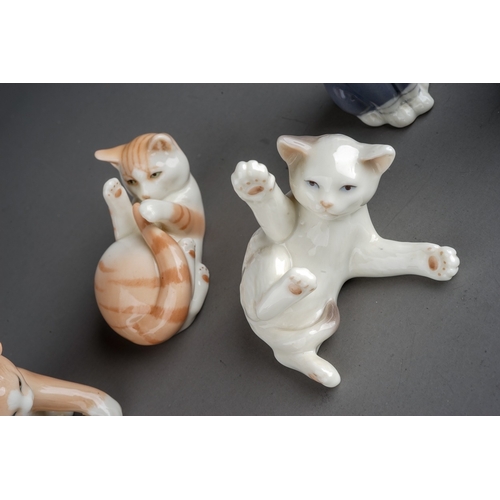 420 - A group of six Royal Copenhagen mini collection cats to include pattern no: 677, 679, 680, 682, 686 ... 