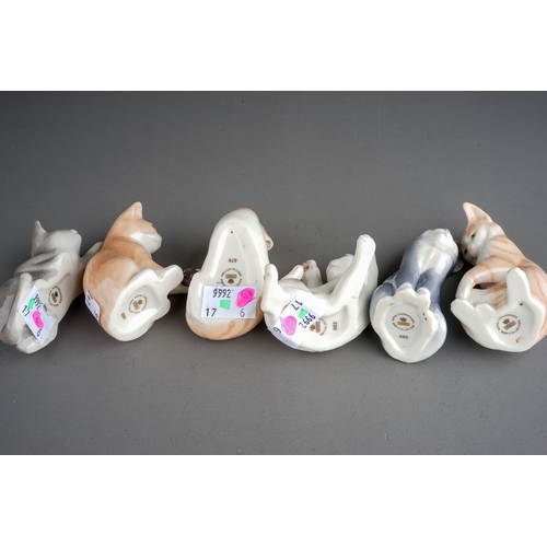 420 - A group of six Royal Copenhagen mini collection cats to include pattern no: 677, 679, 680, 682, 686 ... 