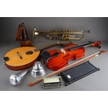Assorted musical instruments to include: 1. an Ozark mandolin, in ...