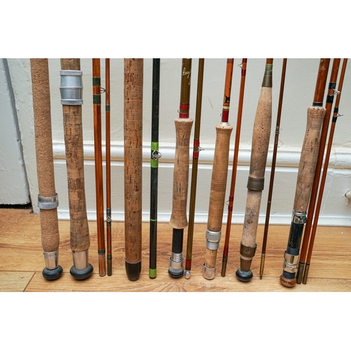 572 - A collection of fishing equipment, primarily rods and reels, the six reels include a brass Milbro, a... 