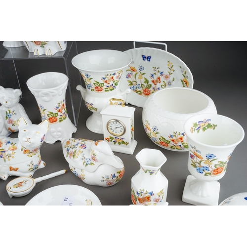 579 - Approximately thirty-nine pieces of Aynsley 'Cottage Garden' pattern giftware, including a quantity ... 