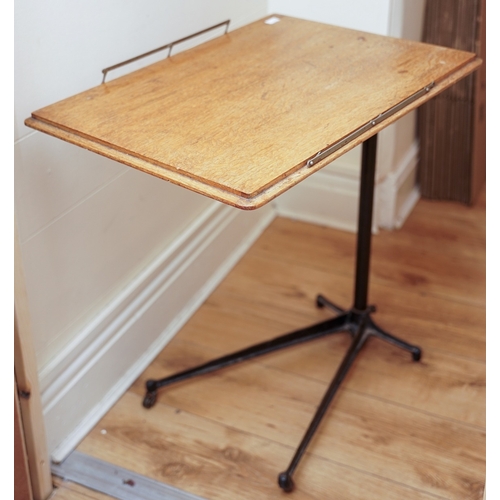 603 - A late 19th Century adjustable cast iron mounted oak tray table, stamped 