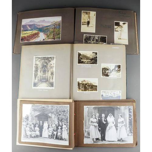 610 - A 1930s photograph album containing topographical black and white photographs, postcards etc of SS B... 