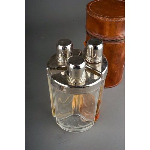 611 - Collector's lot to include:  an Art Deco style set of three chrome mounted glass spirit flasks in fi... 