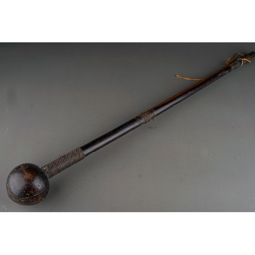 614 - An African Zulu warrier hardwood knobkerrie \ throwing club, wire bound to upper, mid and lower sect... 