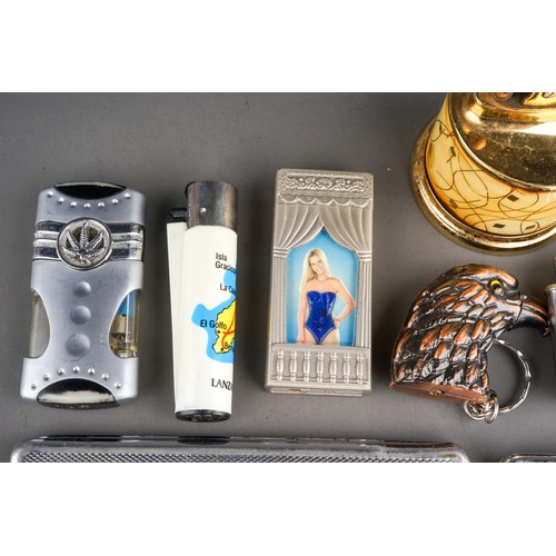 100A - A bag of smoking accessories, comprising two chrome plated cigarette cases, one with initials, a Rol... 