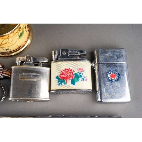 100A - A bag of smoking accessories, comprising two chrome plated cigarette cases, one with initials, a Rol... 