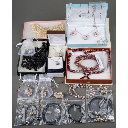 19 - A good group of costume jewellery, including faux pearls, silver earrings, necklaces, pendants, bang... 