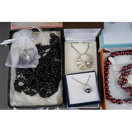 19 - A good group of costume jewellery, including faux pearls, silver earrings, necklaces, pendants, bang... 