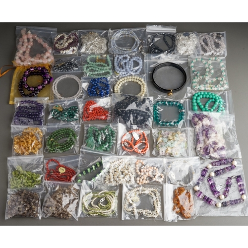 21 - Assorted gem-set necklaces and bracelets, including amethyst, rock crystal, aventurine, jade, haemat... 