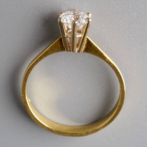 22 - An 18ct yellow gold and diamond solitaire ring, set with a round brilliant-cut diamond approx 0.75ct... 